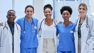 Smiling hospital staff representing a resilient and diverse healthcare workforce