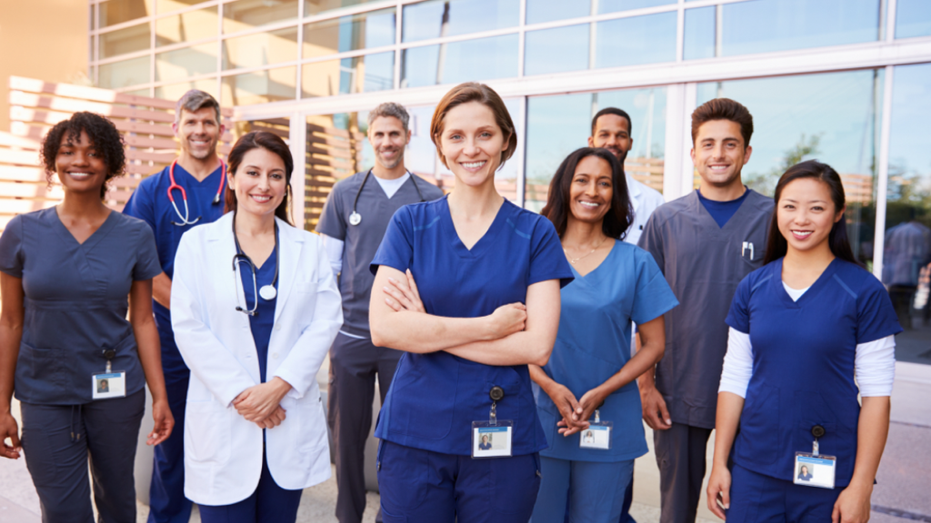 Smiling healthcare professionals representing modern AI-integrated hospital staffing solutions